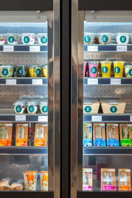a chiller stocked with foods and drinks for vending solutions