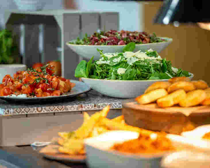 fresh salads being served for warehouse catering