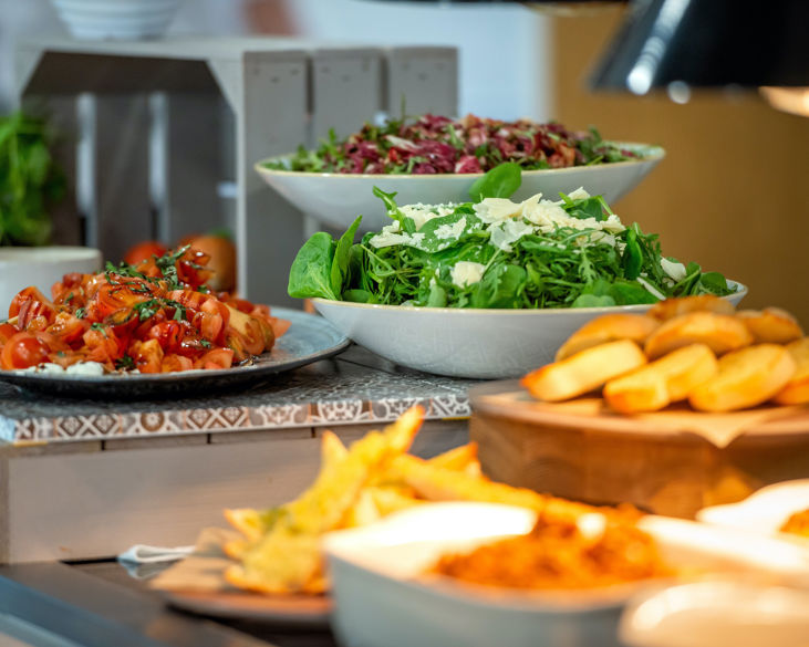 fresh salads being served for warehouse catering